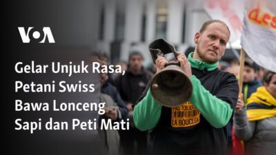 Aksi Protes Petani Swiss dengan Lonceng Sapi dan Peti Mati